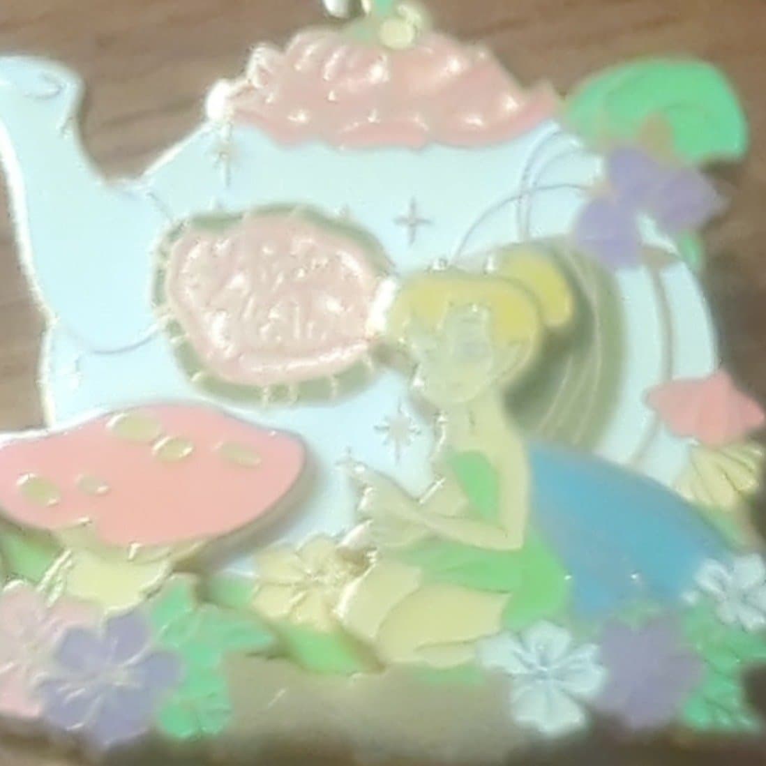 Tinker Bell with her Pixie Hollow Teapot front