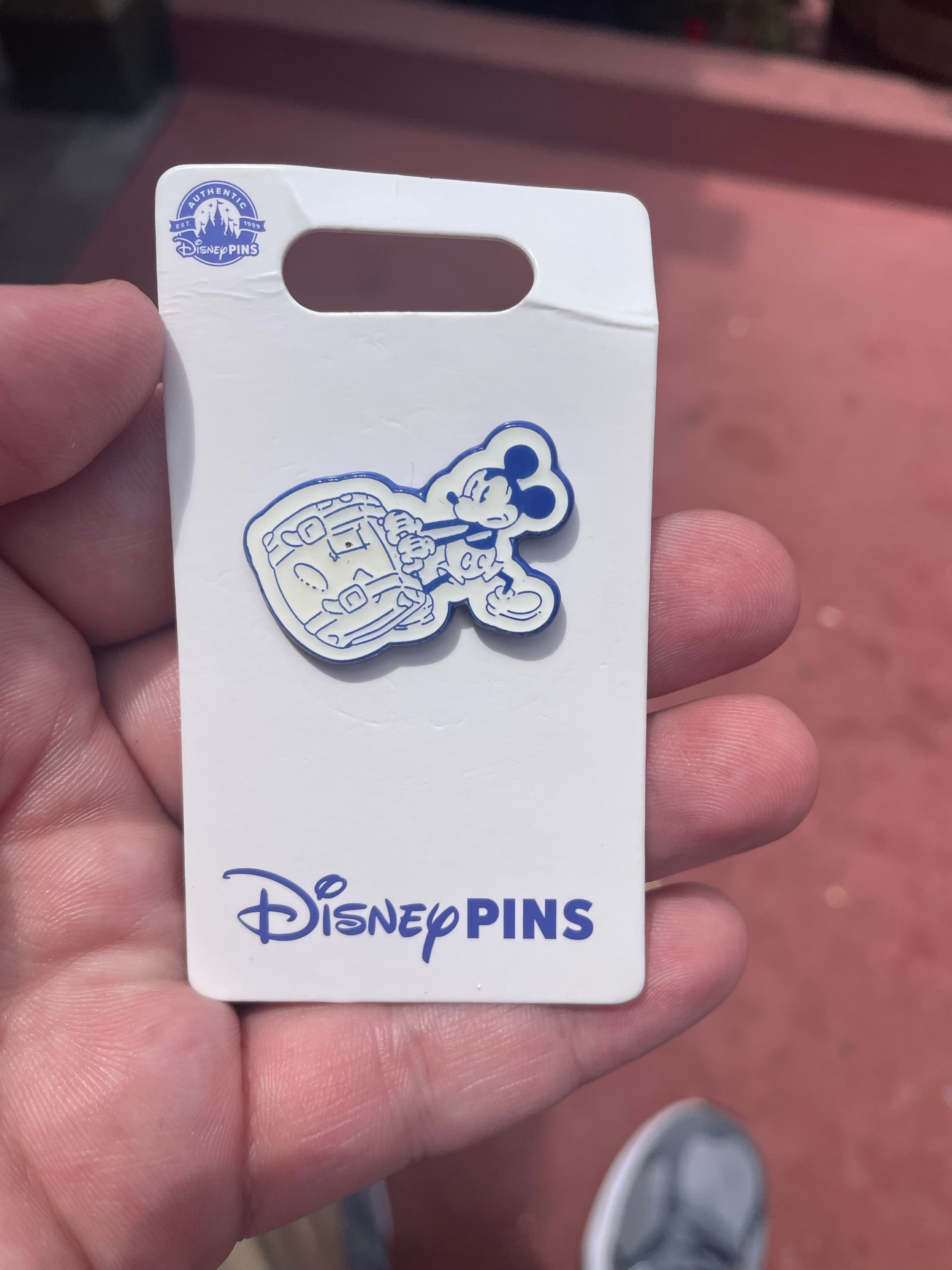 Mickey Lugging Suitcase front