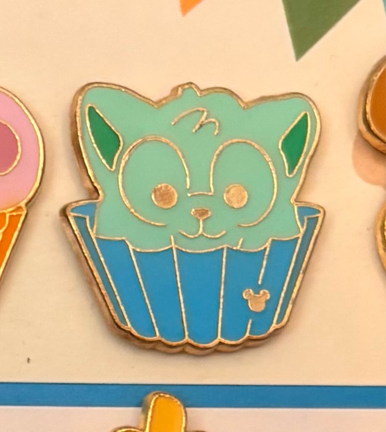 Gelatoni the Cat Cupcake Pin front