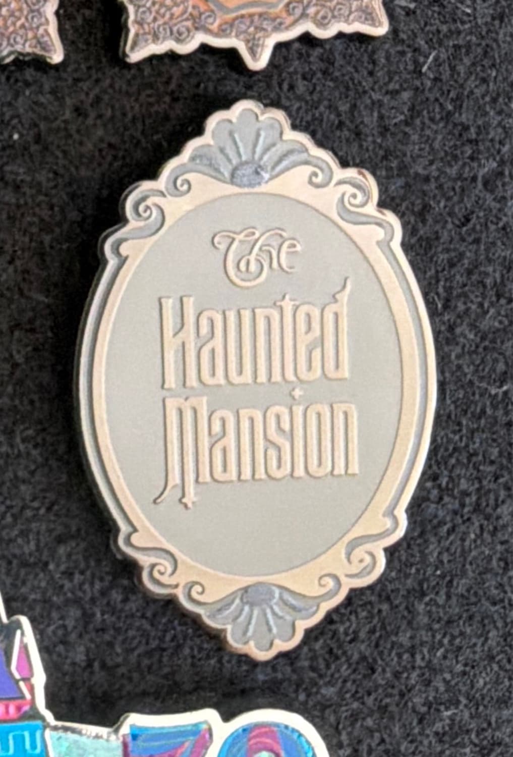 The Haunted Mansion Logo Pin front