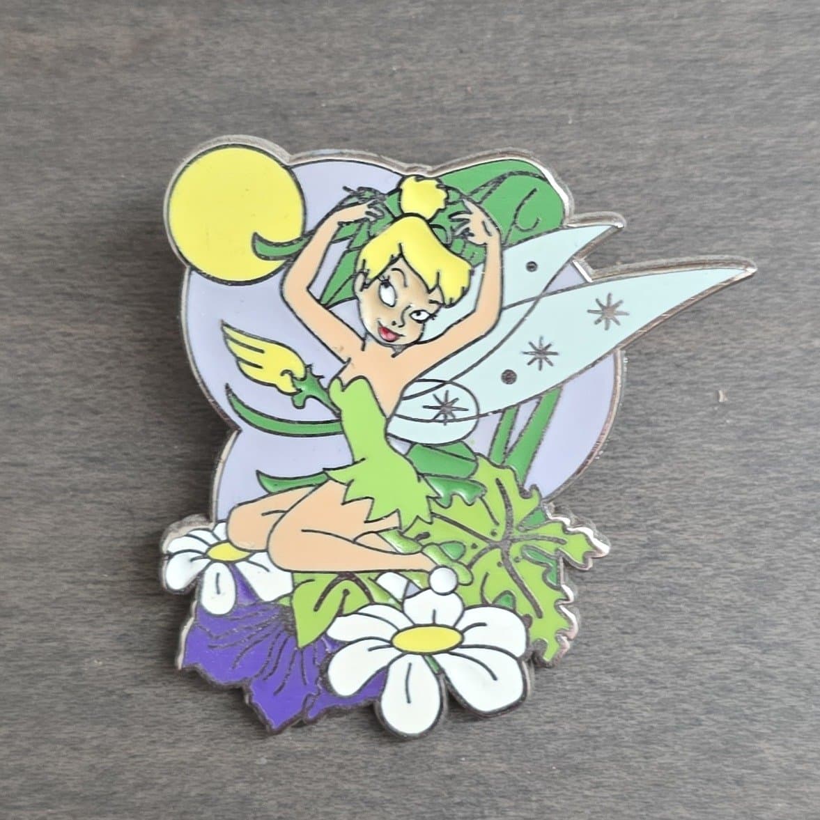 Tinker Bell Sitting & Fixing Her Hair front